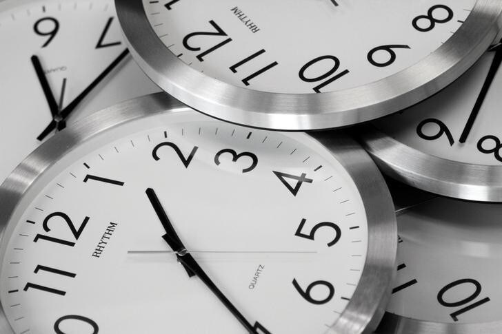 Clocks are seen in an illustration photo, January 25, 2018. REUTERS/Thomas White/Illustration