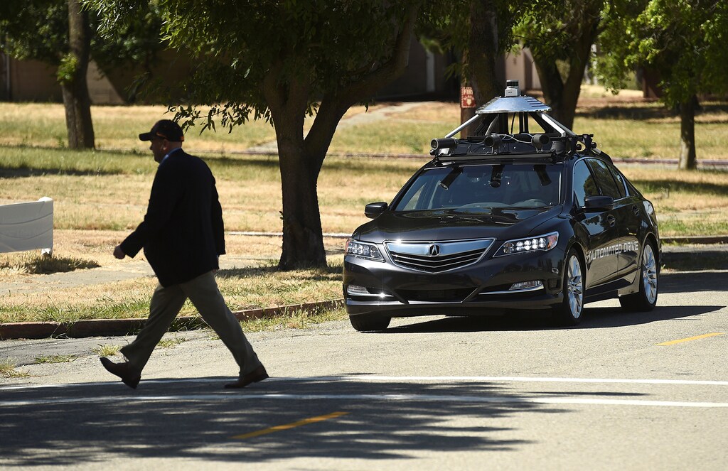 An autonomous version of Acura's RLX Sport Hybrid SH-AWD stops for a simulated pedestrian crossing at carmaker Honda's testing grounds at the GoMentum Station autonomous vehicle test facility in Concord, California June 1, 2016. REUTERS/Noah Berger - S1AETHNVNKAA