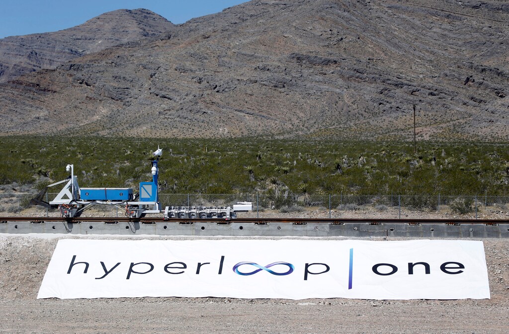 A sled recovery vehicle moves a test sled back to the starting position following a propulsion open-air test at Hyperloop One in North Las Vegas, Nevada, U.S. May 11, 2016. REUTERS/Steve Marcus - RTX2DWEO