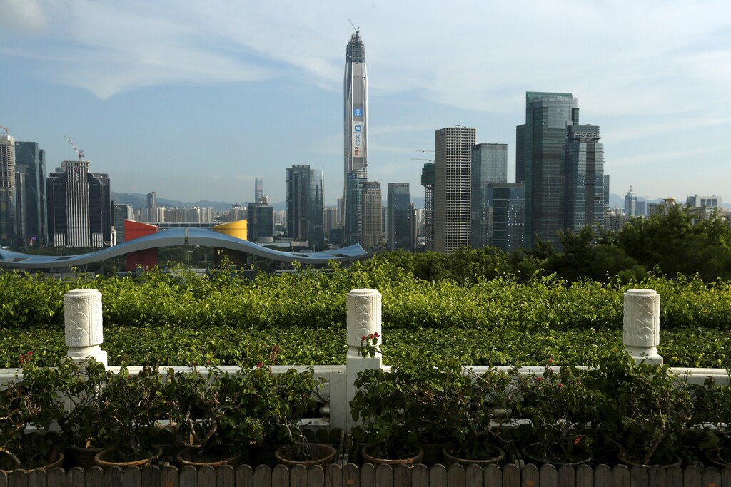 Commercial towers, including the 115-storey Ping An International Finance Centre (C), which is under construction, are seen in Shenzhen, China August 3, 2015. A stream of weak manufacturing data, the fall in the yuan and a stock market rout have painted a gloomy picture of the world's second largest economy over the past few months. But for the property market in China's boomtown of Shenzhen, thing's couldn't be better. Real estate prices in China's answer to Silicon Valley rose by almost a third in August from the same month a year-ago, a further climb from the nearly 24 percent year-on-year increase in July, official data showed, making it the country's hottest property market by far. Picture taken August 3, 2015. REUTERS/Bobby Yip - RTS35PU