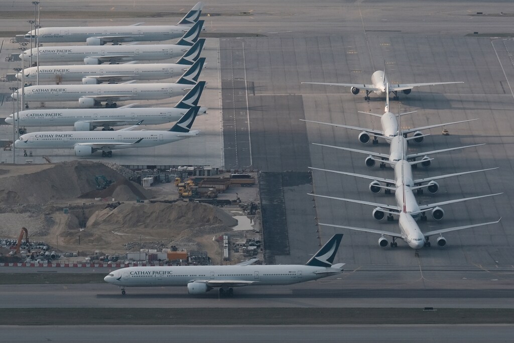 Cathay Pacific aircraft are seen parked on the tarmac at the airport, following the outbreak of the new coronavirus, in Hong Kong, China March 5, 2020. REUTERS/Tyrone Siu - RC2LDF9WBMWC
