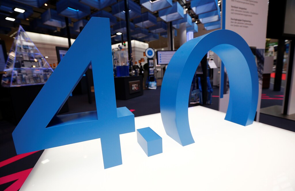An exhibit symbols the fourth industrial revolution "industry 4.0" during the Hannover Fair in Hanover, Germany, April 25, 2016. REUTERS/Wolfgang Rattay - D1BETHKEVDAB