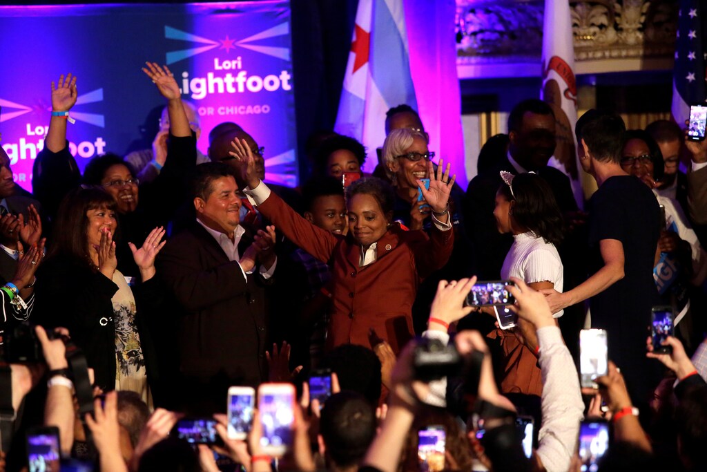 Mayoral candidate Lori Lightfoot (C) celebrates her election night victory after defeating her challenger Toni Preckwinkle in a runoff election in Chicago, Illinois, U.S., April 2, 2019. REUTERS/Joshua Lott - RC1F27C79120