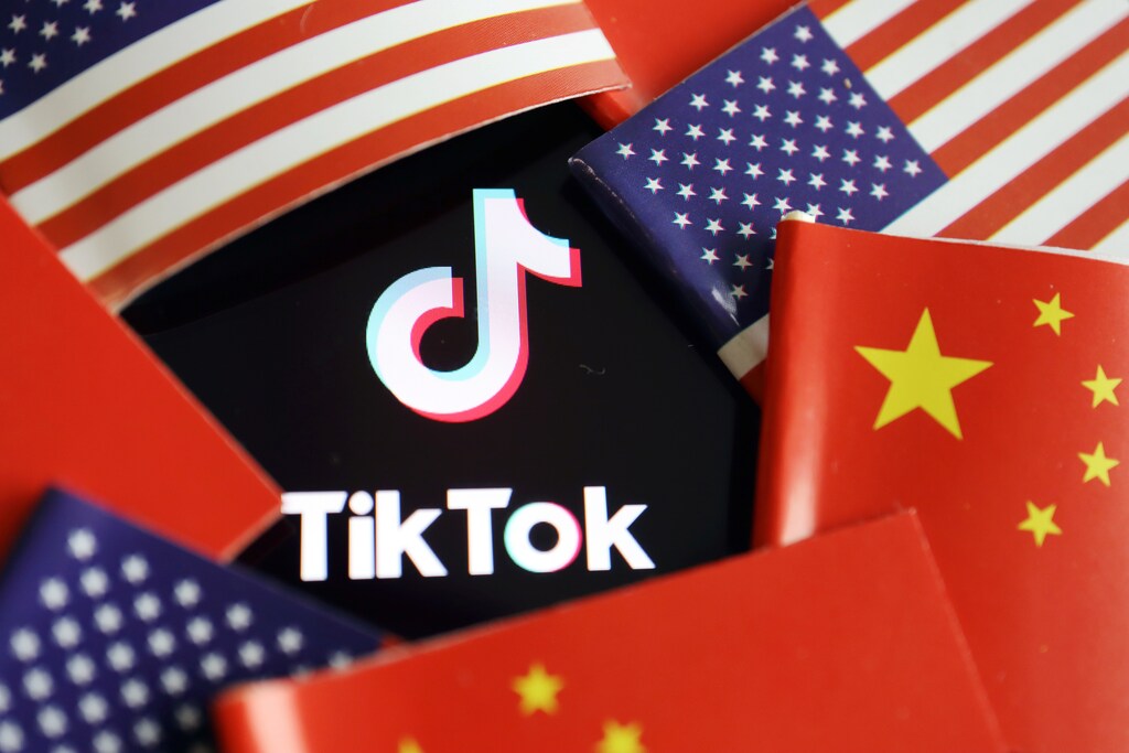 China and U.S. flags are seen near a TikTok logo in this illustration picture taken July 16, 2020.