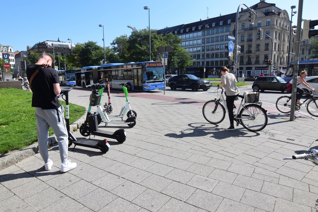 cities An e-scooter user logs on to an app to rent a scooter from Bird in Munich, Germany, September 5, 2021. Picture taken September 5, 2021.