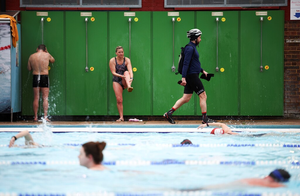 People use outdoor showers at Charlton Lido.