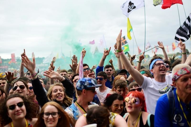 Revellers dance as they listen to Circa Waves perform on the Other Stage at Worthy Farm in Somerset during the Glastonbury Festival in Britain, June 23, 2017. REUTERS/Dylan Martinez - RC12CE4491B0