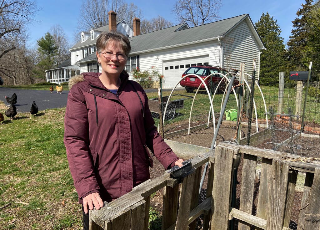 Grace Dowell, 63, poses for a photo at her home in Sunderland, Maryland, U.S., March 18, 2020. Picture taken March 18, 2020. REUTERS/Linda So - RC2SNF9Y4XYG