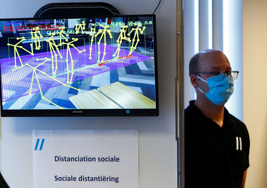 A screen shows social distancing between workers to ensure they maintain their distance to stop the spread of COVID-19 during a demonstration of the technology for the media in Brussels, Belgium May 25, 2020.