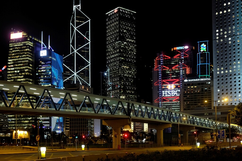 Commercial towers light up in the evening at the financial Central district of Hong Kong, China August 8, 2017. REUTERS/Bobby Yip - RC1C71DE6BB0