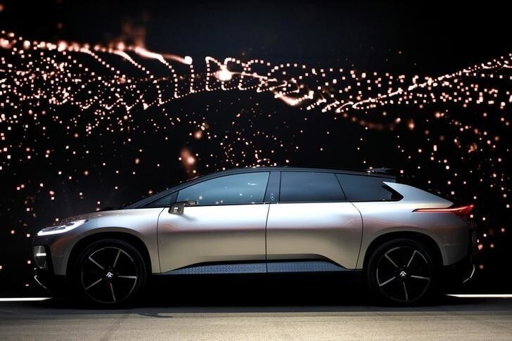 A Faraday Future FF 91 electric car is displayed on stage during an unveiling event at CES in Las Vegas, Nevada January 3, 2017. REUTERS/Steve Marcus TPX IMAGES OF THE DAY