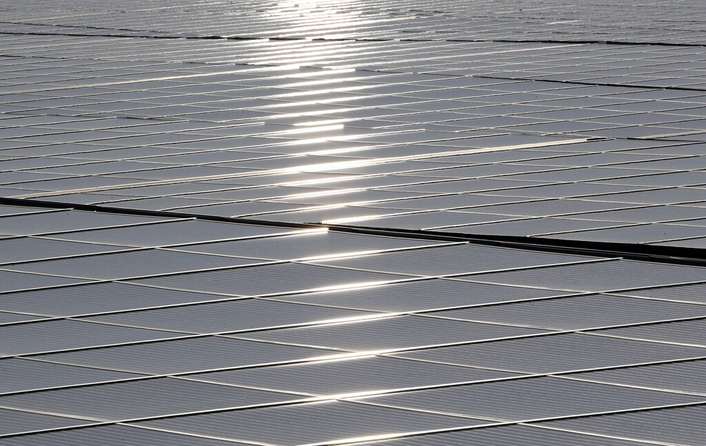A general view shows solar panels used to produce renewable energy at the photovoltaic park during its official inauguration in Cestas, southwestern France