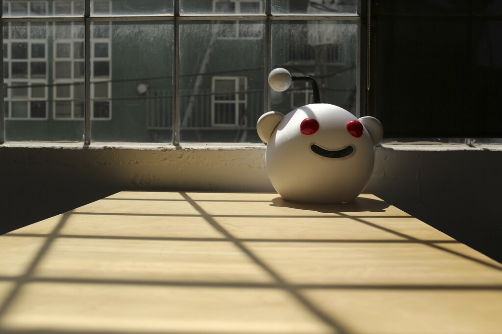 A Reddit mascot is shown at the company's headquarters in San Francisco, California April 15, 2014. Reddit, a website with a retro-'90s look and space-alien mascot that tracks everything from online news to celebrity Q&As, is going after more eyeballs, and advertising, by allowing members of its passionate community to post their own news more quickly and easily. REUTERS/Robert Galbraith (UNITED STATES - Tags: BUSINESS SCIENCE TECHNOLOGY) - GM1EA4G0IMO01