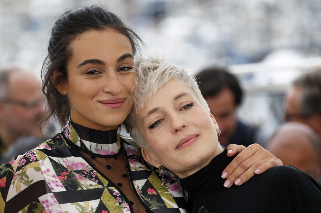 72nd Cannes Film Festival - Photocall for the film "Haut les filles" as part of beach cinema screening - Cannes, France, May 21, 2019. Cast members Camelia Jordana and Jeanne Added pose. REUTERS/Eric Gaillard