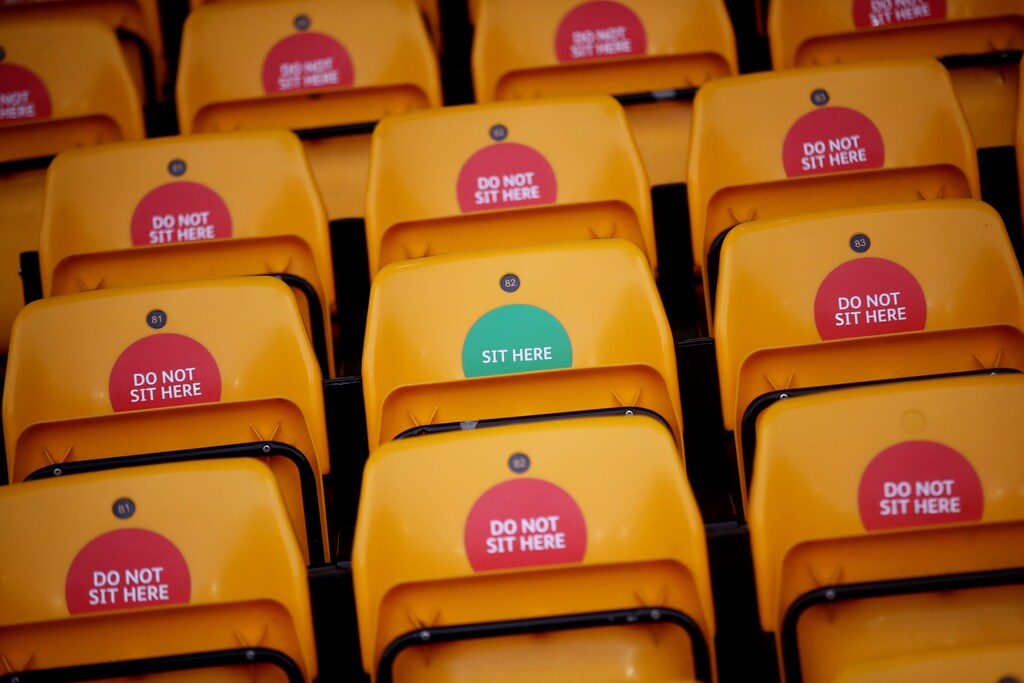 Stickers to enforce social distancing are stuck on seats on the day of a Premier League football match between Wolverhampton Wanderers and West Bromwich Albion at Molineux Stadium, during the coronavirus disease (COVID-19) outbreak, in Wolverhampton, Britain, January 16, 2021. REUTERS/Carl Recine SEARCH "RECINE FANS" FOR THIS STORY. SEARCH "WIDER IMAGE" FOR ALL STORIES - RC239M9NC5ML