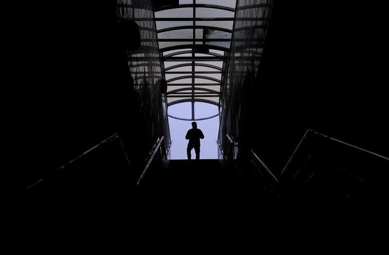 A man walks along a staircase in a pedestrian tunnel in Moscow, Russia November 8, 2019. REUTERS/Evgenia Novozhenina - RC247D9URANO
