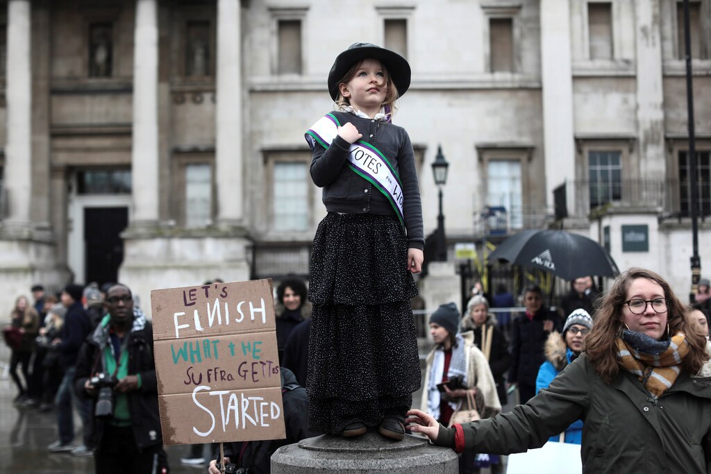 A child dressed as a suffragette demonstrates during the March4Women event in central London, Britain, March 4, 2018. REUTERS/Simon Dawson TPX IMAGES OF THE DAY - RC13A4625540