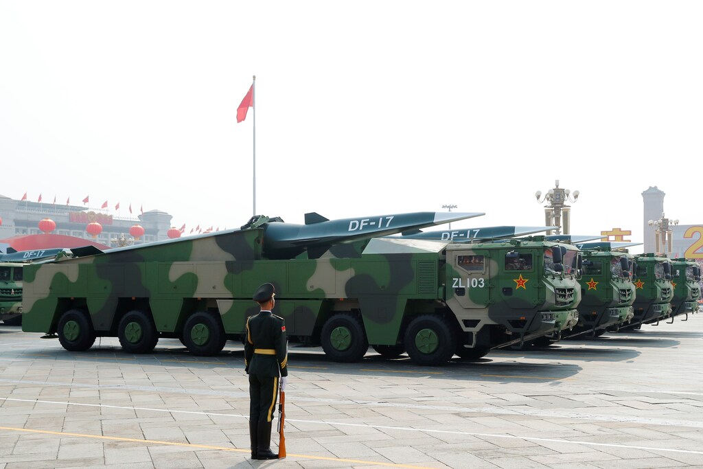 Military vehicles carrying hypersonic missiles DF-17 drive past Tiananmen Square during the military parade marking the 70th founding anniversary of People's Republic of China, on its National Day in Beijing, China October 1, 2019. REUTERS/Thomas Peter - RC15FBEA6400