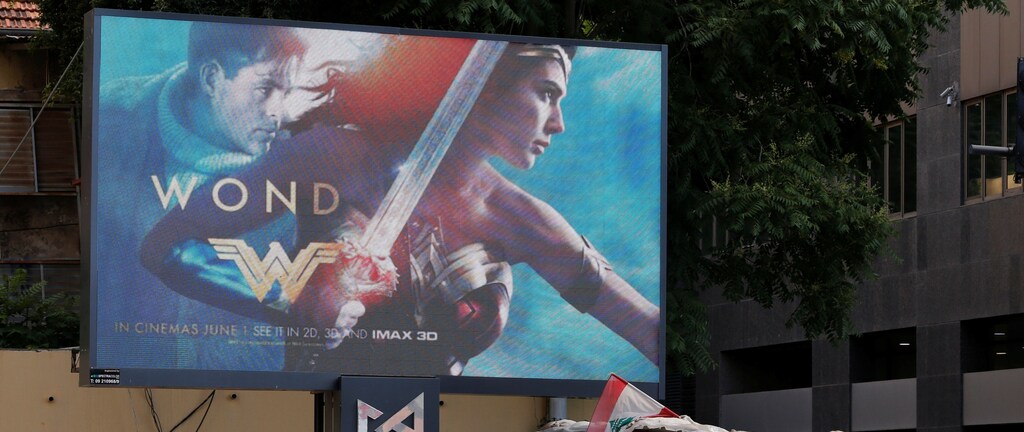 An advertisement of "Wonder Woman" movie is pictured near an army post in Beirut, Lebanon May 31, 2017. REUTERS/Mohamed Azakir - RC1F1FC2B200