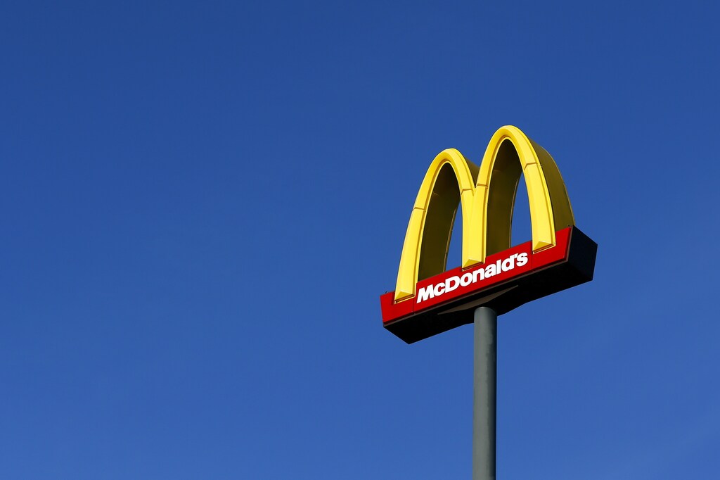A sign for U.S. fast food restaurant chain McDonald's is seen outside one of their restaurants in Sint-Pieters-Leeuw, near Brussels December 3, 2015. REUTERS/Yves Herman - RTX1WZQ2