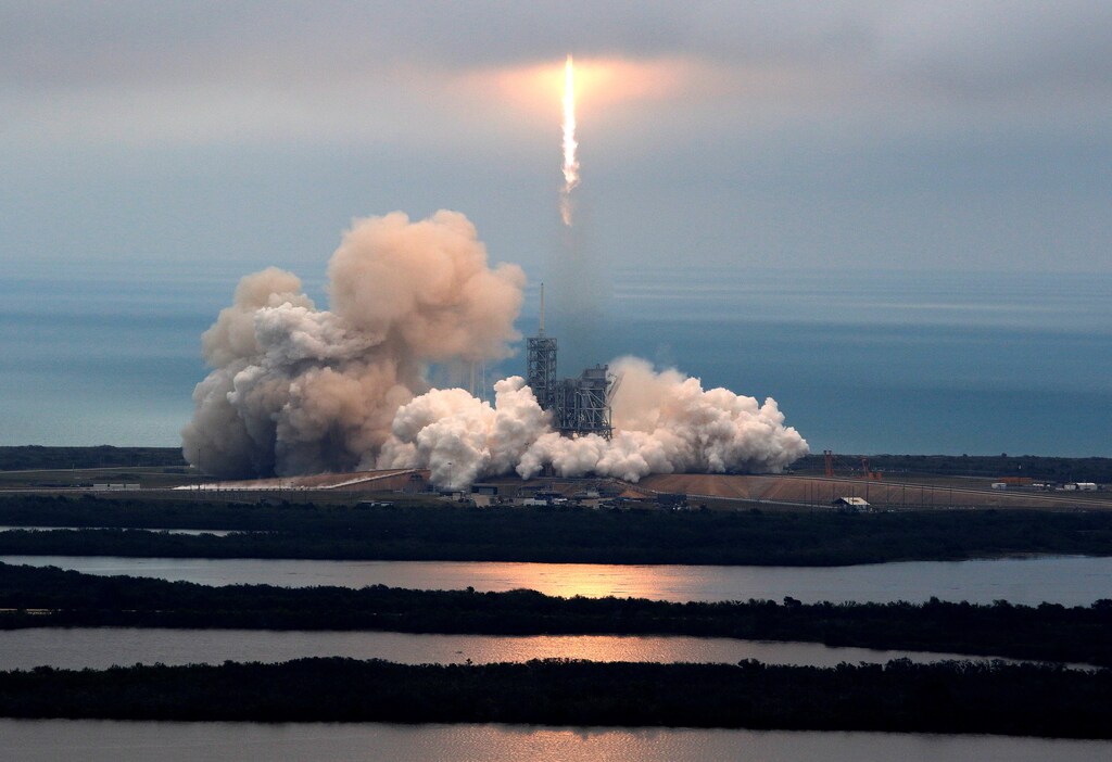 A SpaceX Falcon 9 rocket disappears into clouds after it lifted off on a supply mission to the International Space Station from historic launch pad 39A at the Kennedy Space Center in Cape Canaveral, Florida, U.S., February 19, 2017. REUTERS/Joe Skipper TPX IMAGES OF THE DAY - RTSZDO8