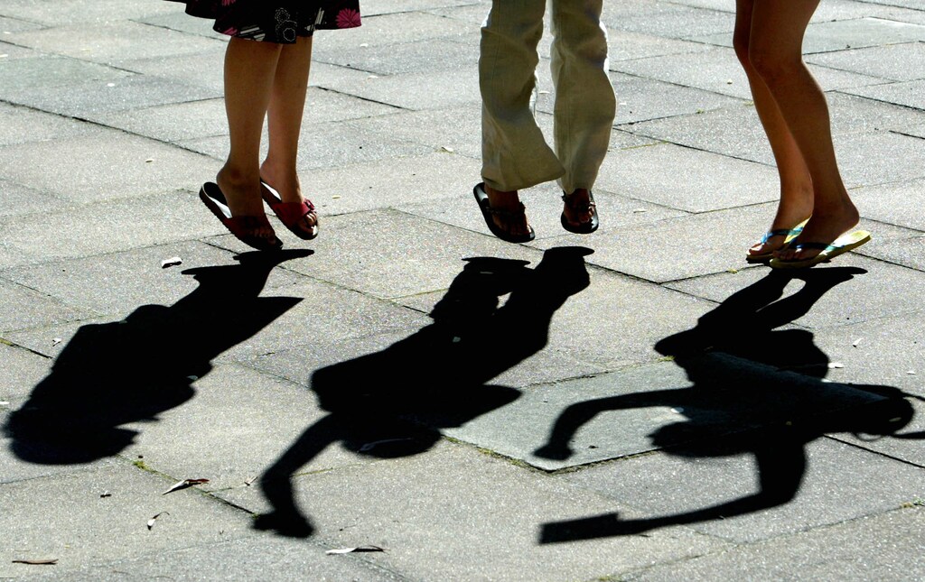 Shadows are cast as pupils celebrate their A-level exam results at Godolphinand Latymer School, Hammersmith, West London, August 14, 2003. Britainunveiled record A-Level results on Thursday reigniting the annual row overwhether the benchmark exams are being "dumbed down". NO RIGHTS CLEARANCES OR PERMISSIONS ARE REQUIRED FOR THIS IMAGEREUTERS/Toby MelvilleNMB - RP4DRIFRKGAB