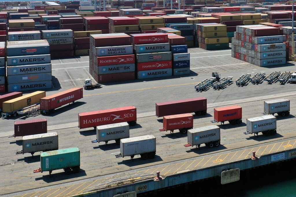 Containers are seen on a shipping dock, as the global outbreak of the coronavirus disease (COVID-19) continues, in the Port of Los Angeles, California, U.S., April 16, 2020. REUTERS/Lucy Nicholson - RC216G9XMK66