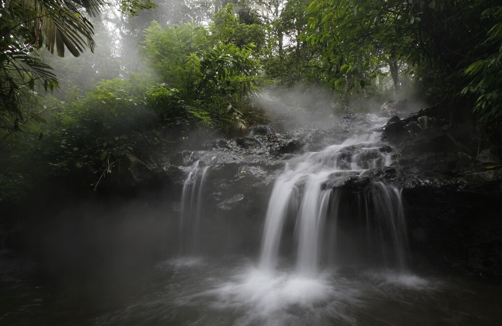 A view of a waterfall in the protected forest at the Welirang mountain in Malang, East Java province, February 10, 2010. Indonesia's Forestry Minister Zulkifli Hasan on Wednesday said he had revoked the land use permits for 23 mining and other firms operating in forested areas and may crack down further, indicating a tougher stance on environmental protection. Indonesia is under international pressure to do more to save its huge tracts of tropical forest, which act as carbon sinks and help reduce the amount of greenhouse gas emissions that cause global warming. To match INTERVIEW INDONESIA-FOREST/ REUTERS/Sigit Pamungkas (INDONESIA - Tags: ENVIRONMENT POLITICS DISASTER SOCIETY IMAGES OF THE DAY) - GM1E62A1O5T01