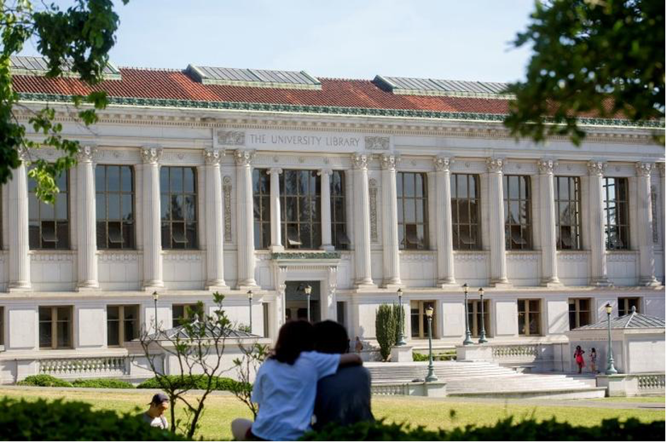 A couple is seen in front of UC Berkeley's library. Every year, the same six universities dominate the global rankings.