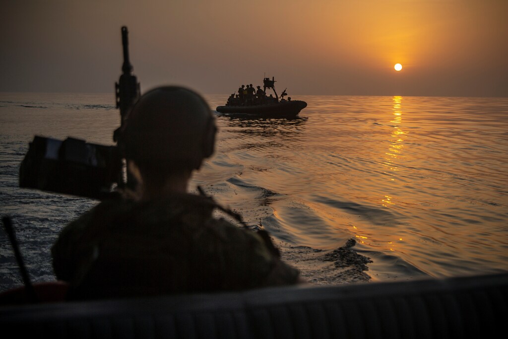 Marines and Sailors with the Maritime Raid Force, 11th Marine Expeditionary Unit (MEU) and Sailors with Assault Craft Unit 1, operate rigid-hull inflatable boats during a visit, board, search and seizure training exercise in Gulf, in this undated handout picture released by U.S. Navy on July 25, 2019. Matthew Teutsch/U.S. Navy/Handout via REUTERS ATTENTION EDITORS- THIS IMAGE HAS BEEN SUPPLIED BY A THIRD PARTY. - RC1ACF6CC370