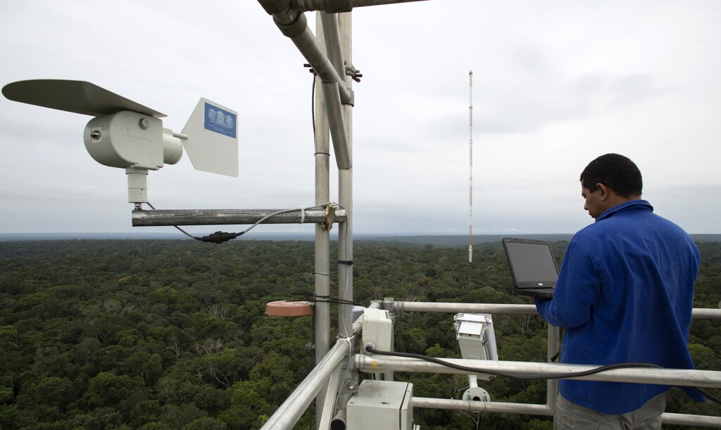 A worker monitors the Amazon Tall Tower Observatory (ATTO) in Sao Sebastiao do Uatuma in the middle of the Amazon forest in Amazonas state January 9, 2015.