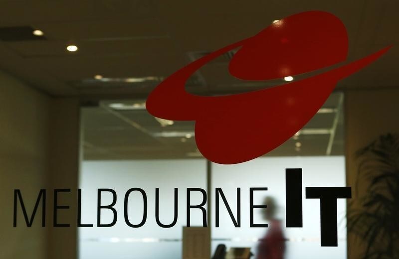 A woman walks inside the MelbourneIT offices in central Sydney August 28, 2013. MelbourneIT, an Australian Internet service provider that sells and manages domain names including Twitter.com and NYTimes, said on Tuesday the credentials of a reseller had been used improperly to change domain settings and hack into sites including the NYTimes.com. Officials at The New York Times identified MelbourneIT as its domain name registrar and the primary victim of hacking by supporters of the Syrian government and warned its employees to stop sending sensitive e-mails from their corporate accounts.