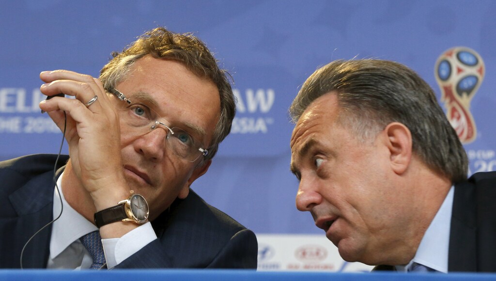 FIFA Secretary General Jerome Valcke (L) listens to Russian Sports Minister Vitaly Mutko during a news conference in St. Petersburg, Russia, July 24, 2015. Valcke all but confirmed on Friday that he will be leaving his job when Sepp Blatter is replaced as president of world soccer's governing body next February. REUTERS/Maxim Shemetov - RTX1LNQ1