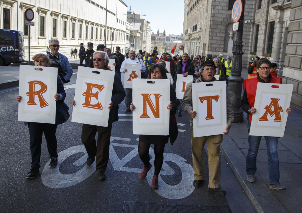 Spanish demonstrators demanding universal basic income.