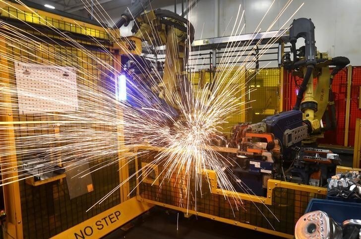 Robot welders on the floor of Alfield Industries, a subsidiary of Martinrea, one of three global auto parts makers in Canada, in Vaughan, Ontario, Canada April 28, 2017. Picture taken April 28, 2017. REUTERS/Fred Thornhill