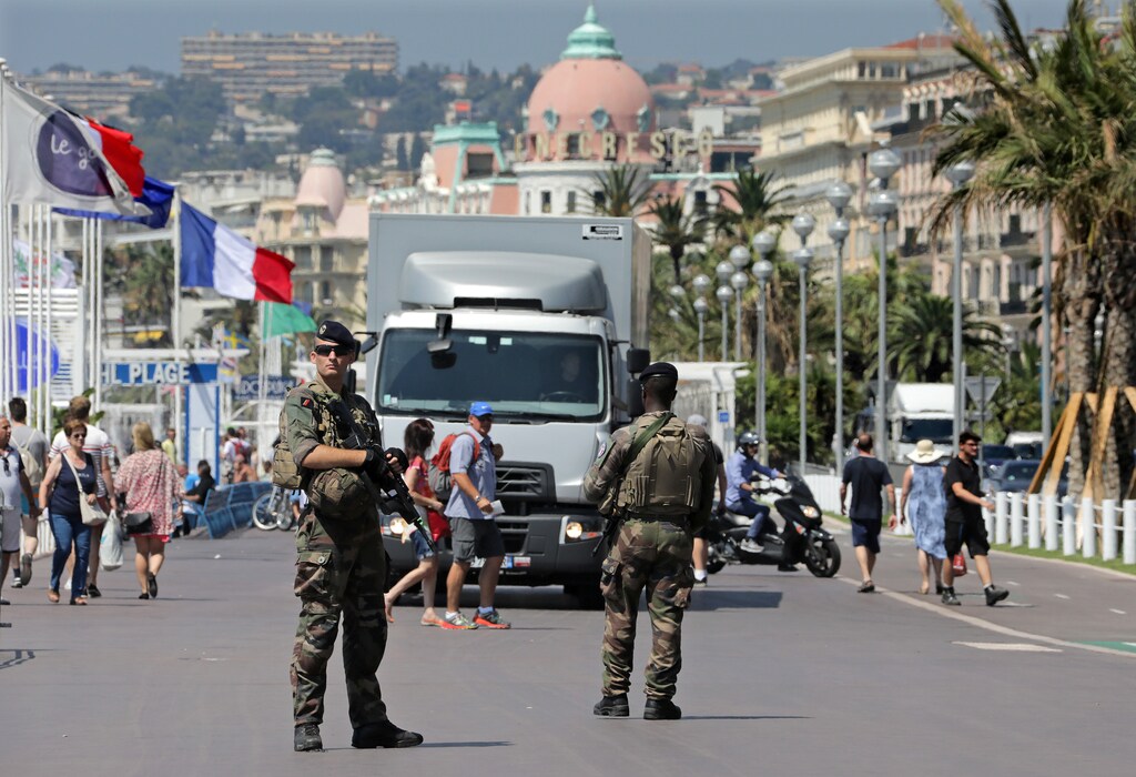 French soldiers patrol the promenade in Nice, France, a year after the fatal July 14 truck attack