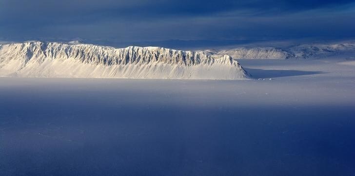 Eureka Sound on Ellesmere Island in the Canadian Arctic is seen in a NASA Operation IceBridge survey picture taken March 25, 2014. IceBridge is a six-year NASA airborne mission which will provide a yearly, multi-instrument look at the behavior of the Greenland and Antarctic ice, according to NASA. Picture taken March 25, 2014. REUTERS/NASA/Michael Studinger/Handout (CANADA - Tags: SCIENCE TECHNOLOGY ENVIRONMENT) ATTENTION EDITORS - THIS PICTURE WAS PROVIDED BY A THIRD PARTY. REUTERS IS UNABLE TO INDEPENDENTLY VERIFY THE AUTHENTICITY, CONTENT, LOCATION OR DATE OF THIS IMAGE. THIS PICTURE IS DISTRIBUTED EXACTLY AS RECEIVED BY REUTERS, AS A SERVICE TO CLIENTS. FOR EDITORIAL USE ONLY. NOT FOR SALE FOR MARKETING OR ADVERTISING CAMPAIGNS