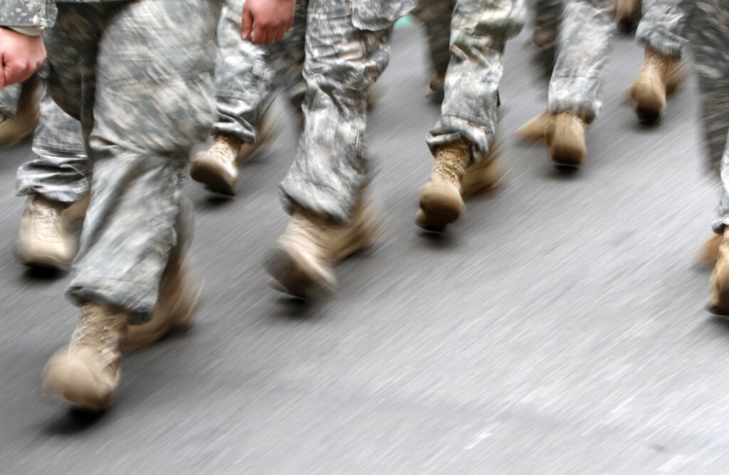 U.S. army soldiers are seen marching in the St. Patrick's Day Parade in New York, March 16, 2013. REUTERS/Carlo Allegri (UNITED STATES - Tags: SOCIETY) - RTR3F326
