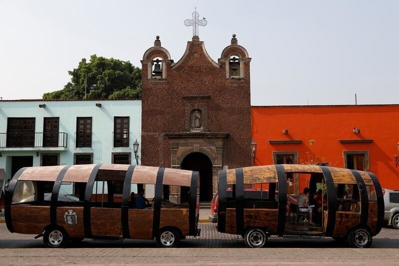 A tourist car in the shape of a tequila barrel is seen on a street in Tequila, Jalisco, Mexico, April 11, 2018. Picture taken on April 11, 2018.