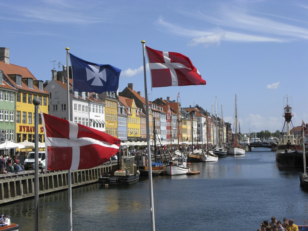 The Nyhavn canal, part of the Copenhagen Harbor and home to many bars and restaurants, is seen August 11, 2008. In times like these, no one is immune to depression. But surveys show the Danes are the happiest people in the world, and a core factor is a quality in global short supply -- trust. Picture taken August 11, 2008. To match feature FINANCIAL/DENMARK/HAPPINESS REUTERS/Teis Hald Jensen (DENMARK) - GM1E4AG0LLE01