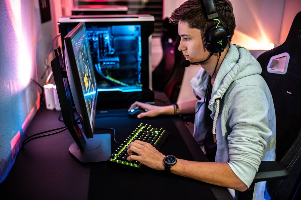 A young man playing video games.