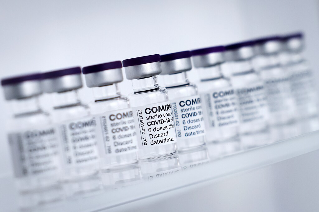 Empty vials of Pfizer/BioNTech's Comirnaty vaccine.