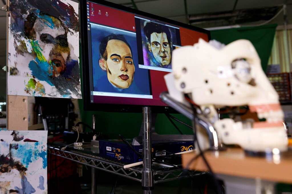 Digital artwork by humanoid robot Sophia, developed by Hanson Robotics, are seen at her studio before her non-fungible token (NFT) artwork is auctioned, in Hong Kong, China March 16, 2021. Picture taken March 16, 2021. REUTERS/Tyrone Siu - RC25GM9F3OM7
