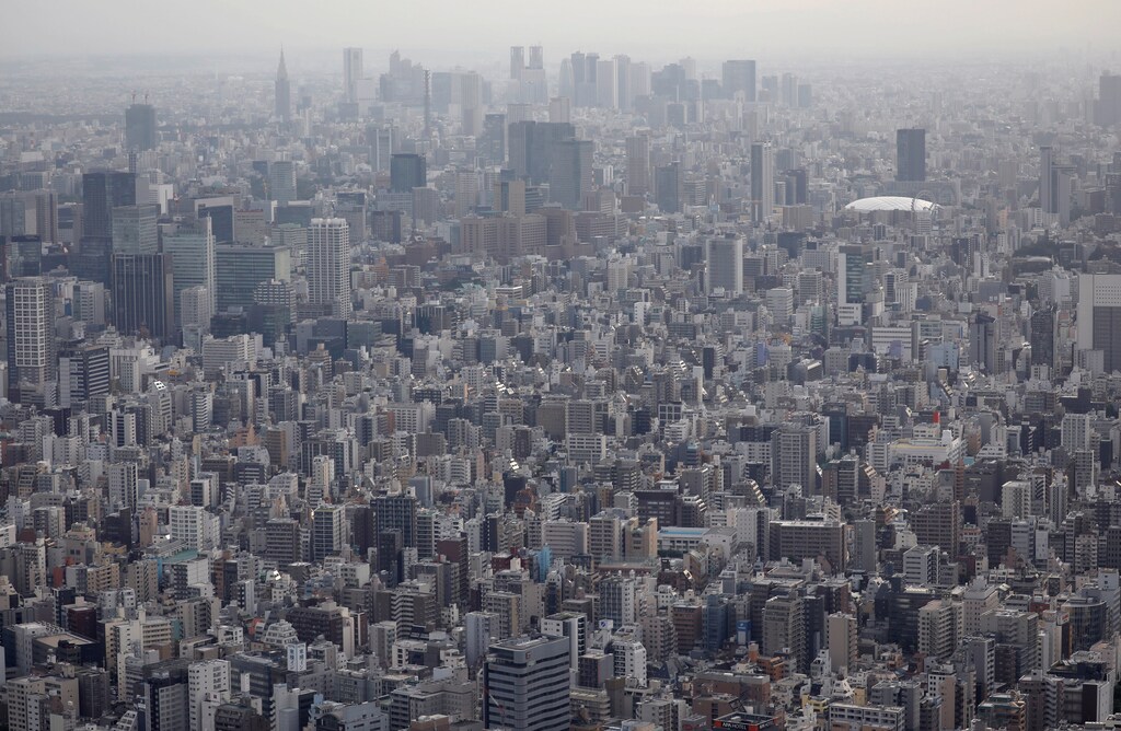 Office and residential buildings are seen from the observation deck of Tokyo Skytree, the world's tallest broadcasting tower, in Tokyo, Japan June 18, 2019. REUTERS/Issei Kato - RC1E42E94890