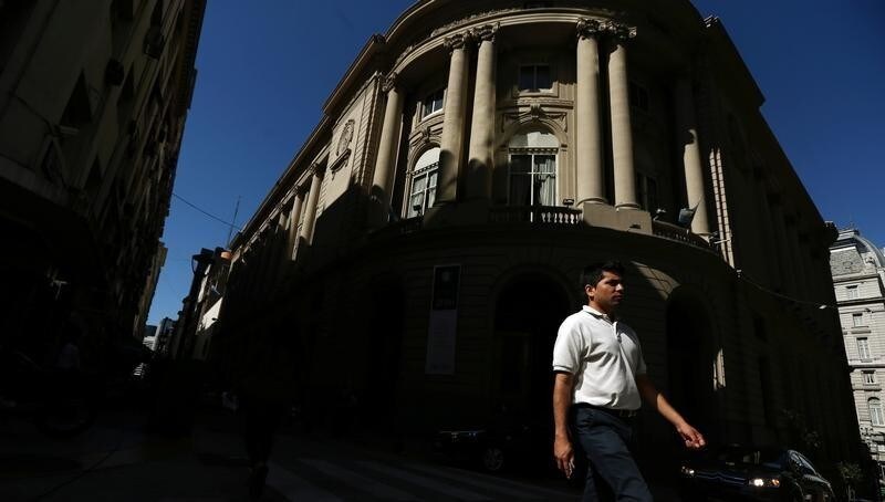 A man walks past the main entrance of the Buenos Aires Stock Exchange, Argentina, January 12, 2017. REUTERS/Marcos Brindicci - RTX2YPX1