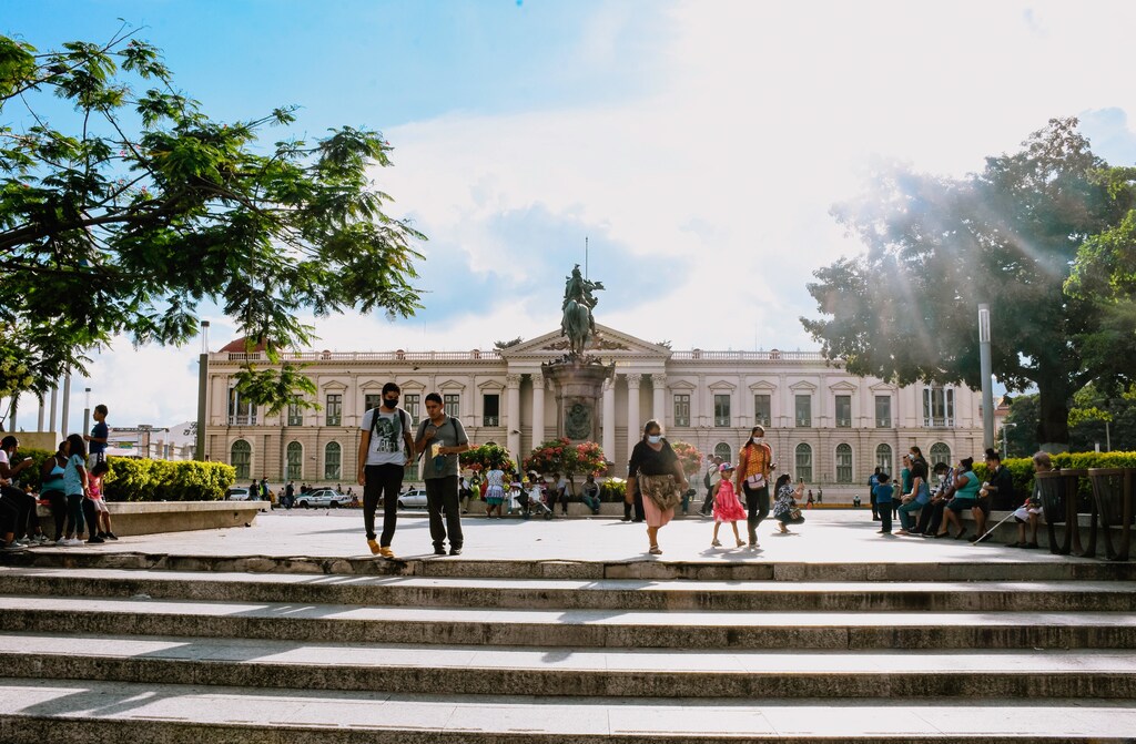 People walk in a plaza in San Salvador, El Salvador, as the Forum works to implement ESG principles in Central America.