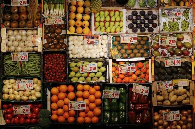 Fruits and vegetables are displayed to be sell at a shop of a food market in the Andalusian capital of Seville, southern Spain March 7, 2016. REUTERS/Marcelo del Pozo - D1AESRDRUFAB