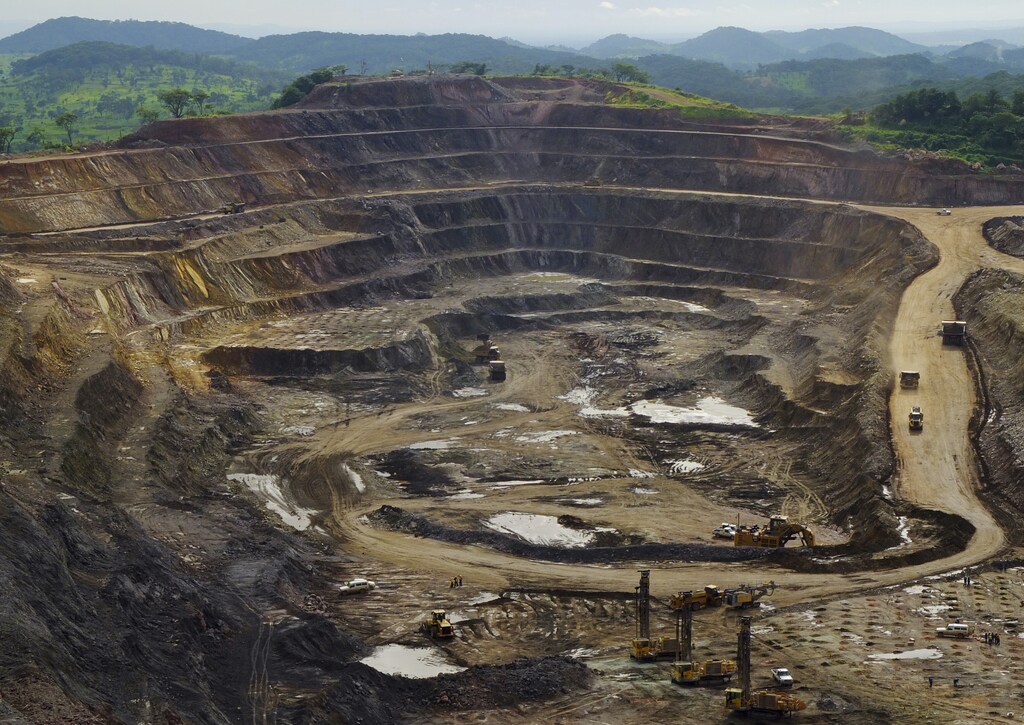An open pit cobalt and copper mine in the DRC. Caption: There are opportunities to meaningfully improve the way companies and institutions from the Global North approach critical mineral projects in developing countries: