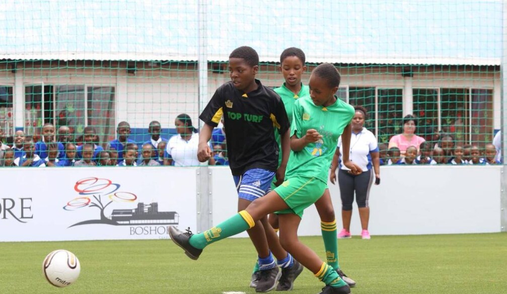 Students play football on a GreenSource field in South Africa which filters 17 million litres of clean water per year. Photo taken on 22 April 2019. Handout photo courtesy of