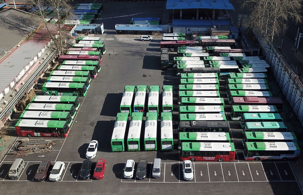 Buses are seen parked at a bus terminal in Shijiazhuang, after public transport in the city was halted following a recent outbreak of coronavirus disease (COVID-19), in Hebei province, China January 9, 2021. Picture taken with a drone. cnsphoto via REUTERS ATTENTION EDITORS - THIS IMAGE WAS PROVIDED BY A THIRD PARTY. CHINA OUT. - RC294L9EU2IJ
